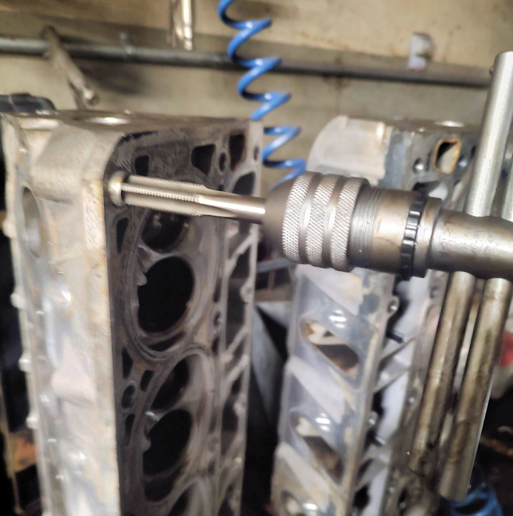 USing a tap to remove stubborn dowel pin from LS cylinder head