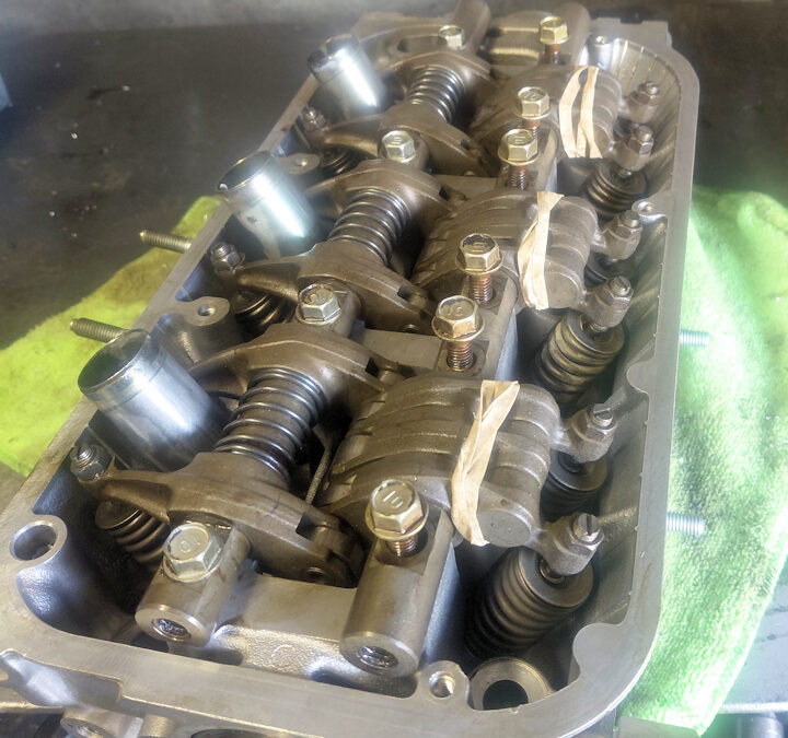 PISTON LOADED ROCKER ARMS
